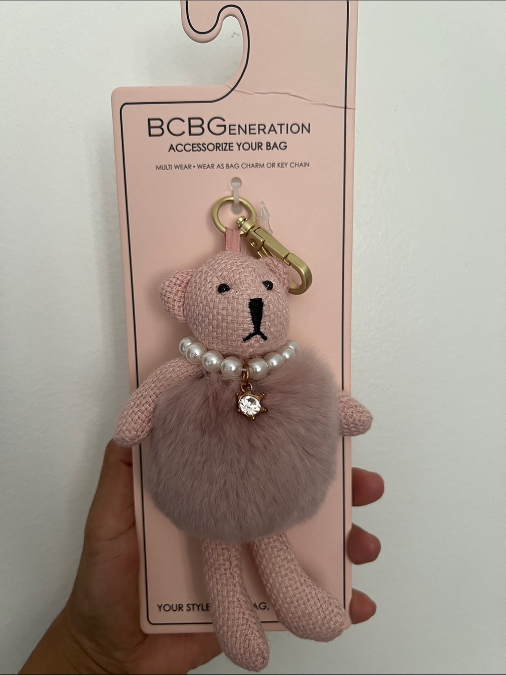 BCBGeneration Pink Teddy Bag Charm with Pearl Necklace & Gold Clasp